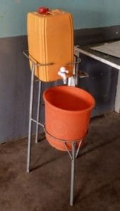 Water container and handwashing station in a healthcare facility in Uganda