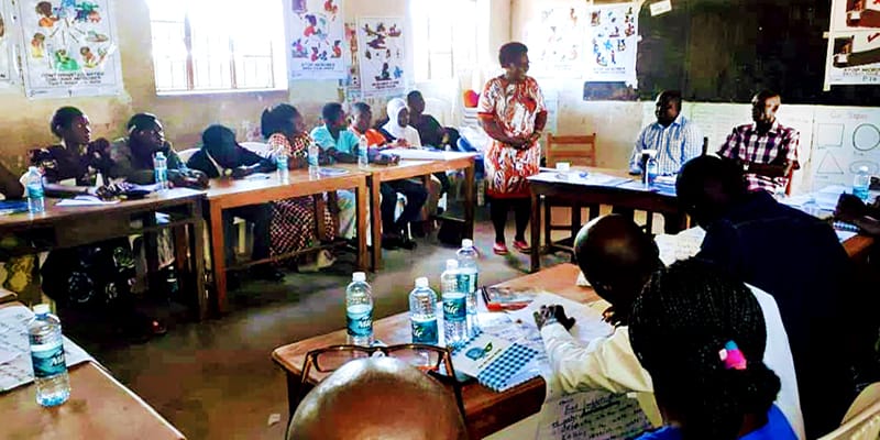 Learning WASH in a classroom in Merikit Uganda
